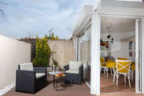 ouverture totale de la véranda, accès direct sur terrasse intime sans vis à vis
