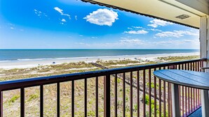 A balcony with a view of the beach and ocean. - Stunning Ocean View from top floor Admirals Row 402  (Hilton Head Island)