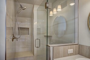 Combined shower/bathtub, hair dryer, towels, soap