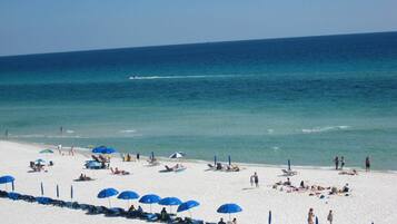 On the beach, sun loungers