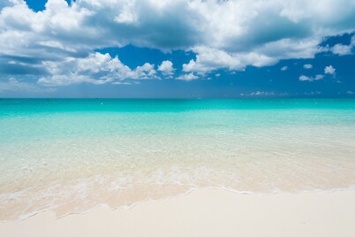 Luxury beachfront 2 bedroom condo at The Grandview directly on Grace Bay beach