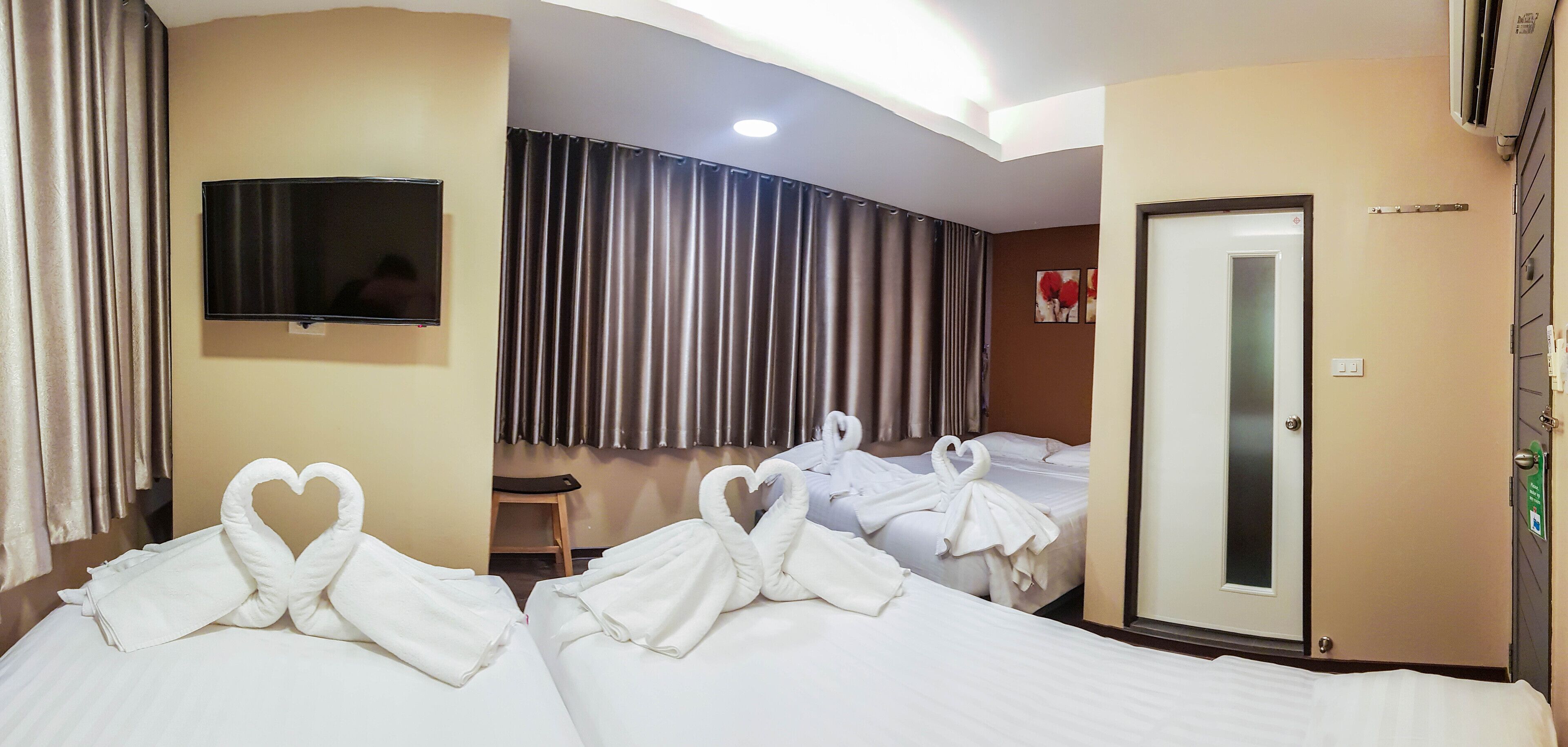 deluxe triple room | premium bedding, minibar, in-room safe, free wifi