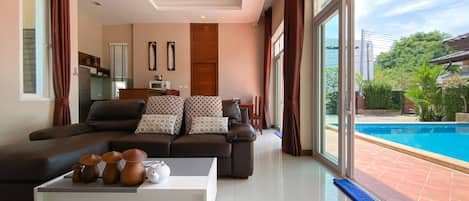 3 Bedroom Pool Villa with Garden | Living area | Flat-screen TV