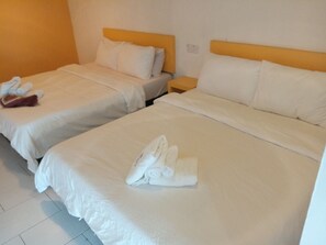 Family Room, 2 Queen Beds, Non Smoking | Iron/ironing board, free WiFi, bed sheets
