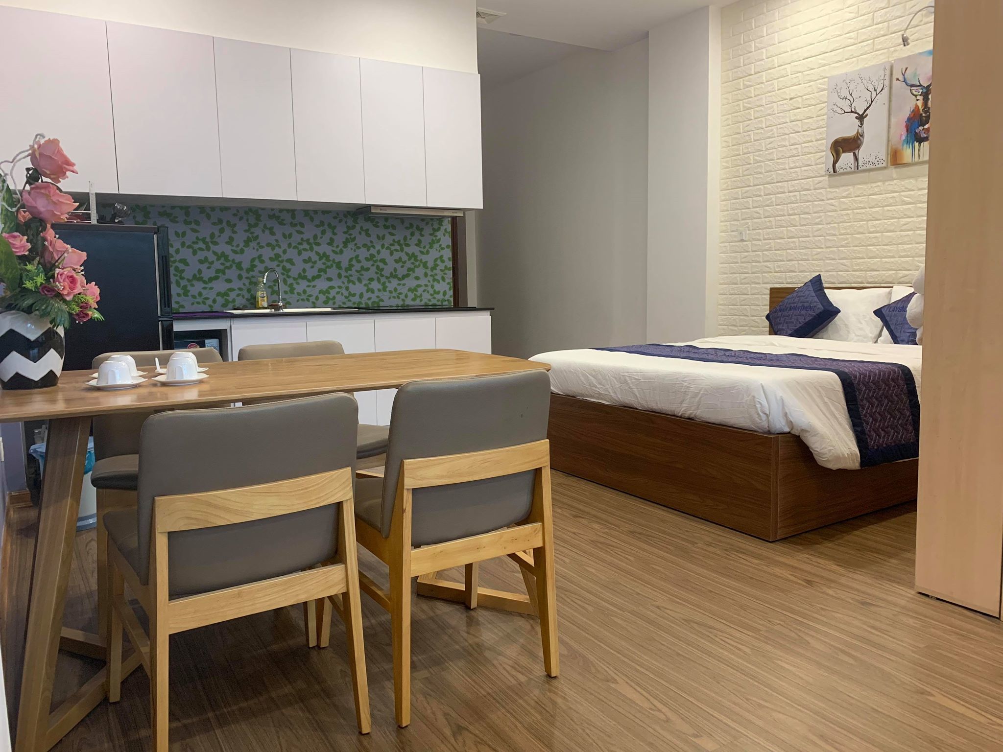 family studio suite | shared kitchen | stovetop, electric kettle, rice cooker, cookware/dishes/utensils