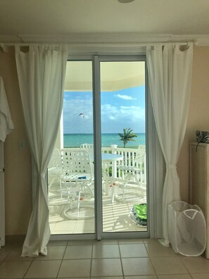 Enjoy the view from your balcony with a table and chairs, perfect for taking in the surrounding landscape.