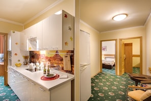 Fridge, microwave, stovetop, coffee/tea maker