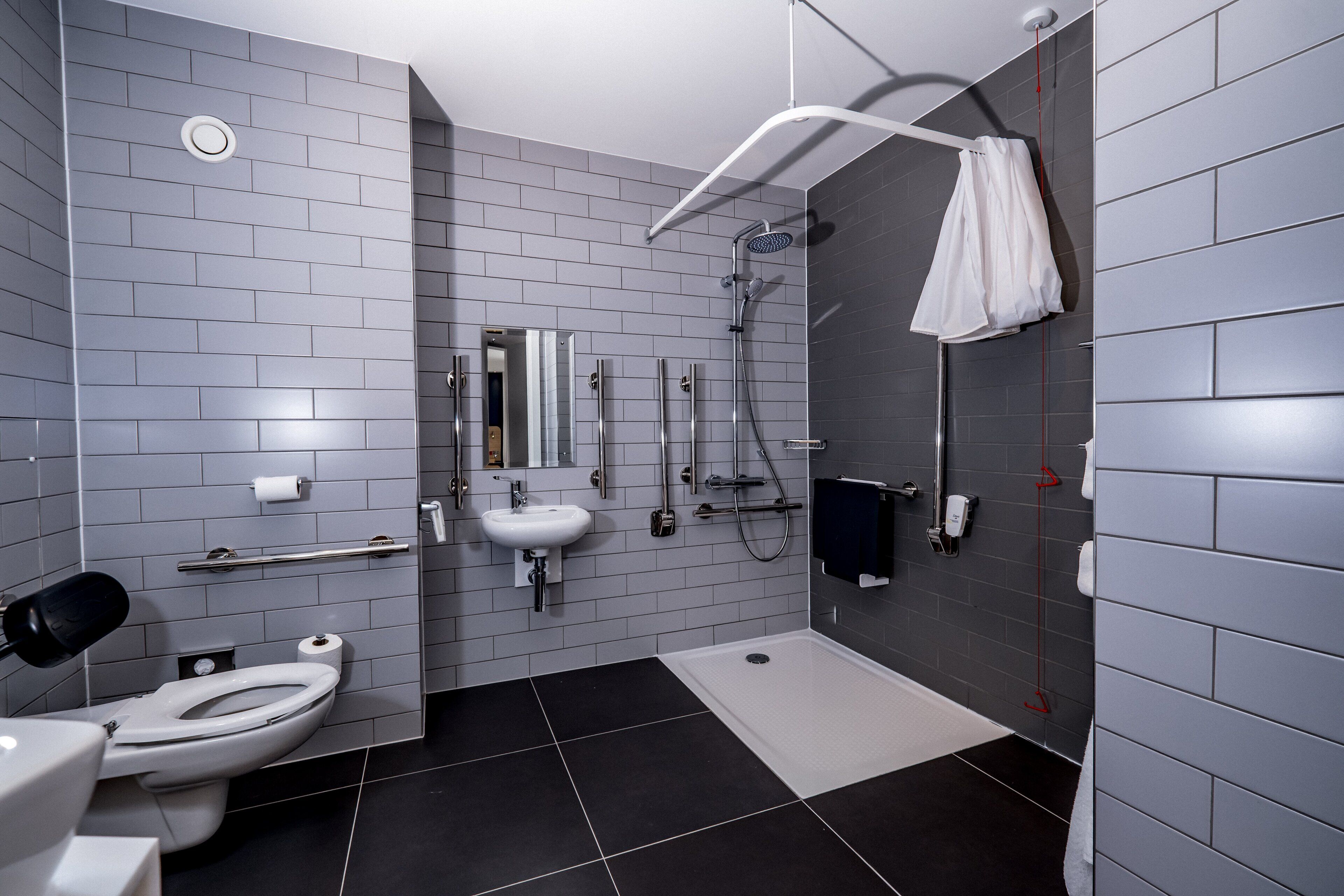 desk, laptop workspace, blackout curtains, iron/ironing board