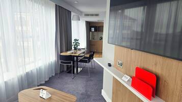 Desk, laptop workspace, blackout curtains, iron/ironing board