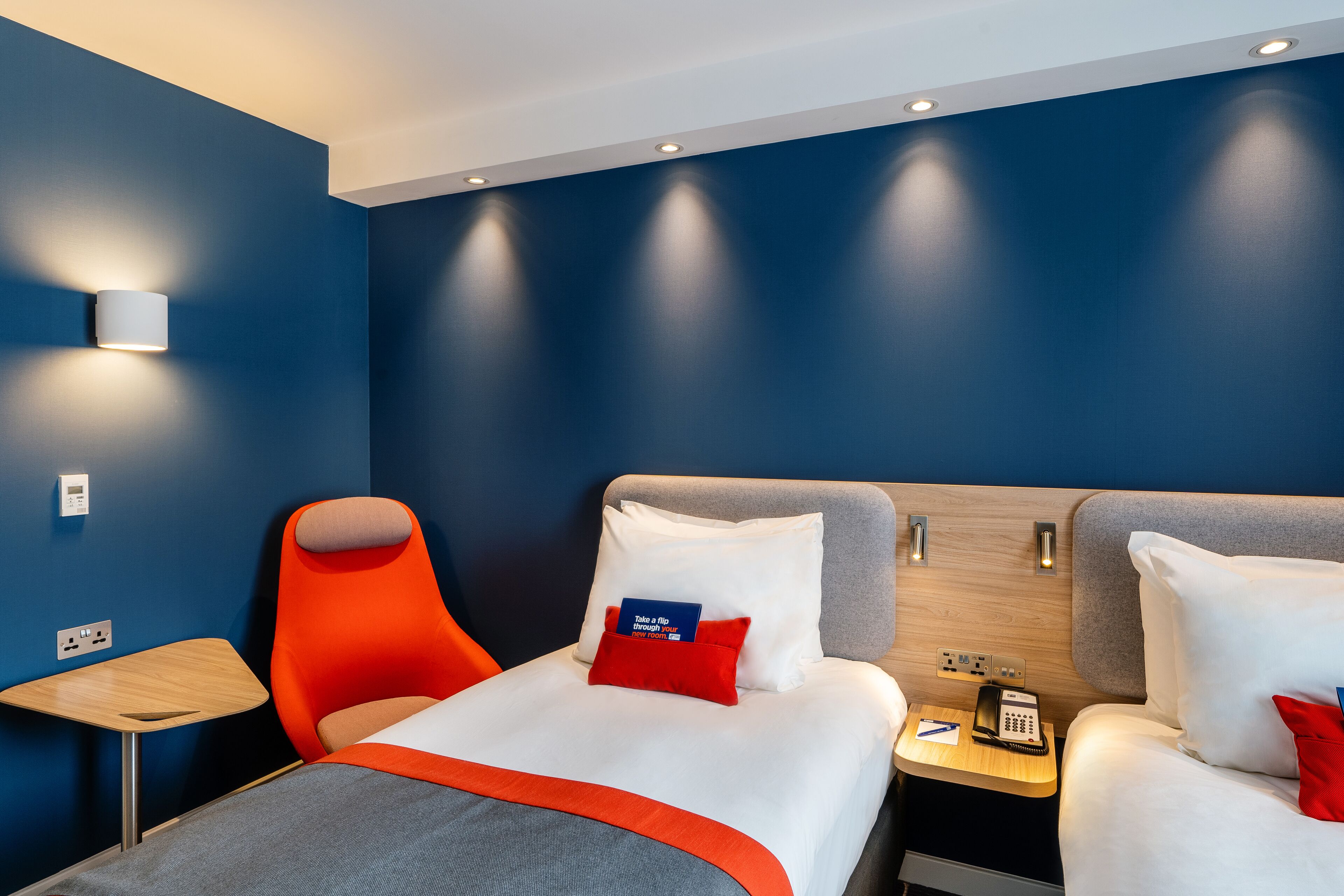 desk, laptop workspace, blackout curtains, iron/ironing board