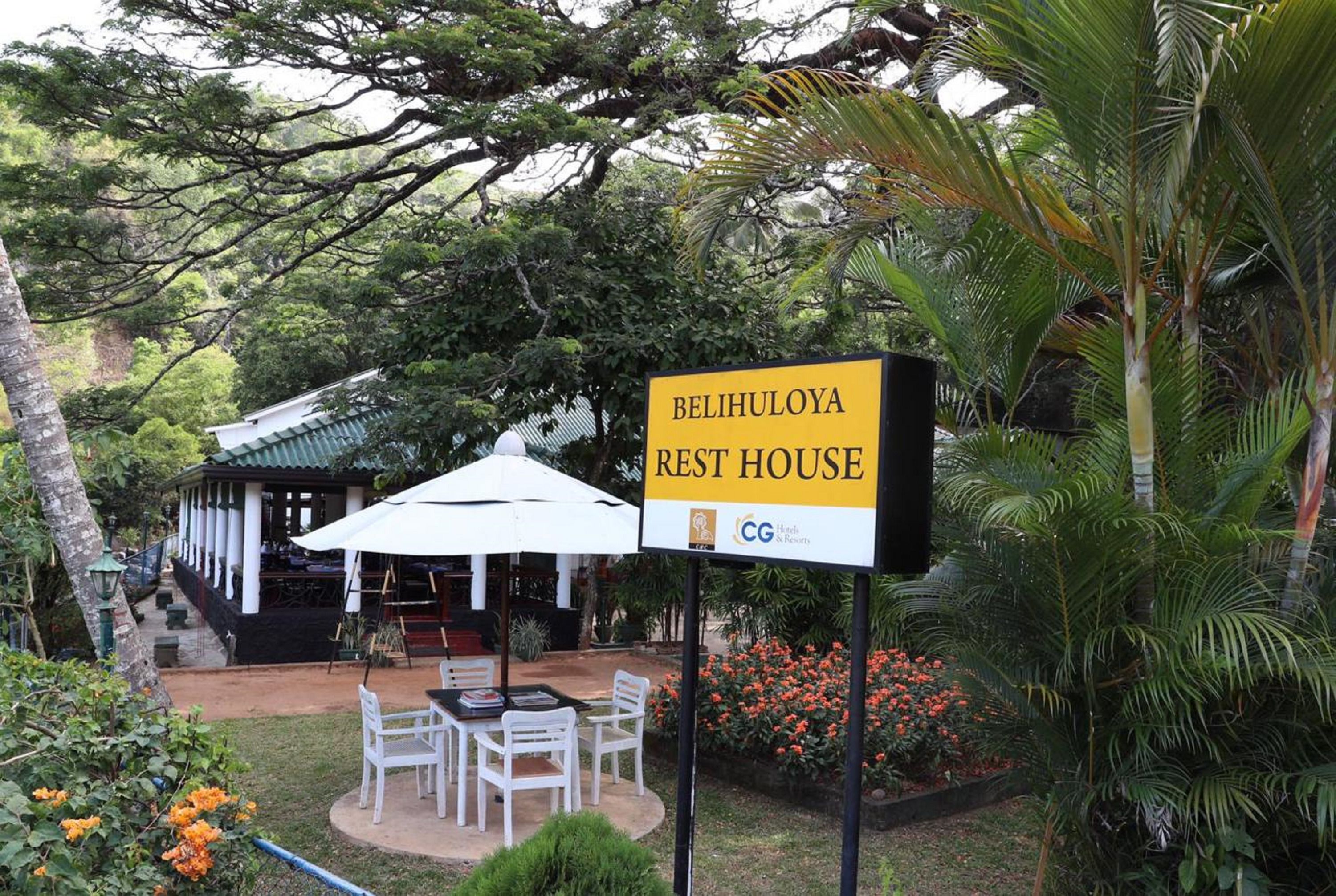 A Belihuloya Rest House with outdoor seating and a covered area.