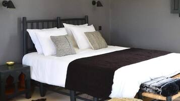 Standaard suite, niet-roken | Verduisterende gordijnen, gratis babybedden, beddengoed