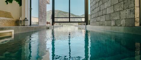 Indoor pool, seasonal outdoor pool, pool loungers