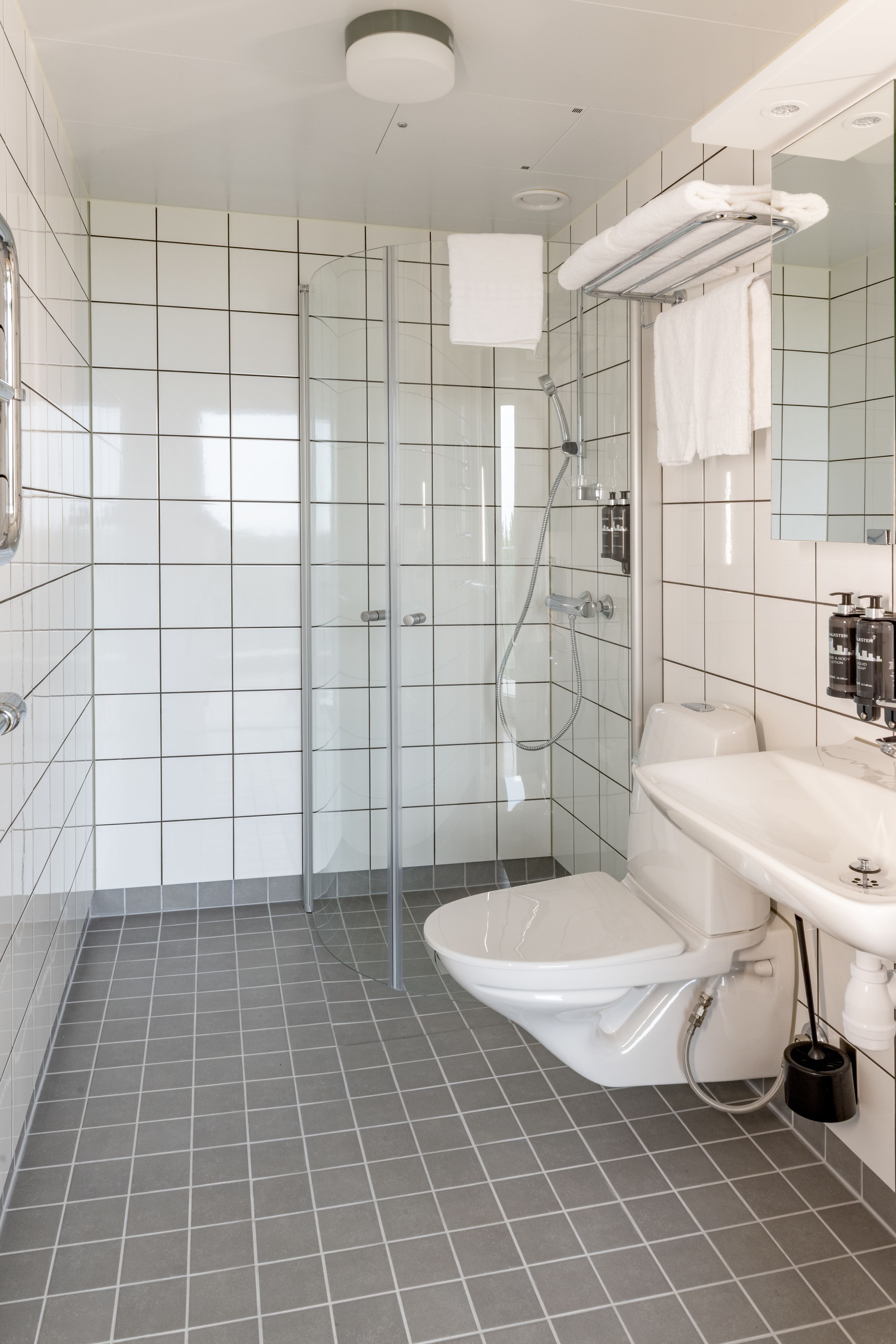 bathroom | shower, free toiletries, hair dryer, slippers
