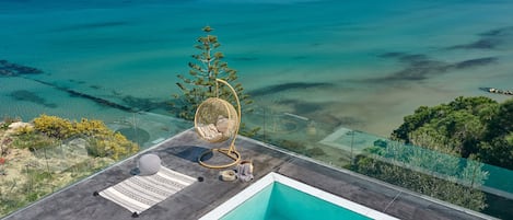 Outdoor pool, pool umbrellas, pool loungers