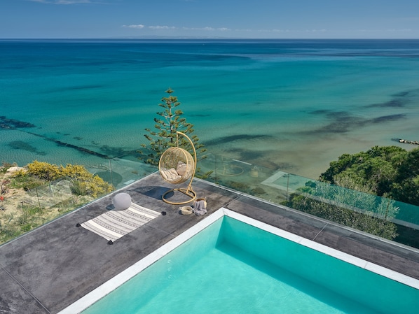 Outdoor pool, pool umbrellas, pool loungers