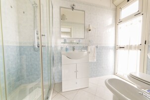 Double or Twin Room, Sea View | Bathroom | Shower, rainfall showerhead, free toiletries, hair dryer