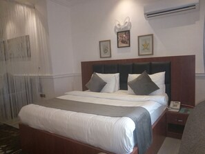 Habitación Premium | Ropa de cama de alta calidad y colchones Select Comfort