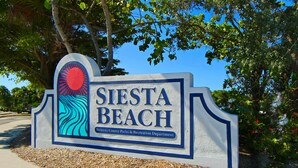A sign for Siesta Beach, Sarasota County Parks & Recreation Department. - Cozy cottage in Gulf Gate to relax year-round in beautiful Sarasota. (Sarasota)