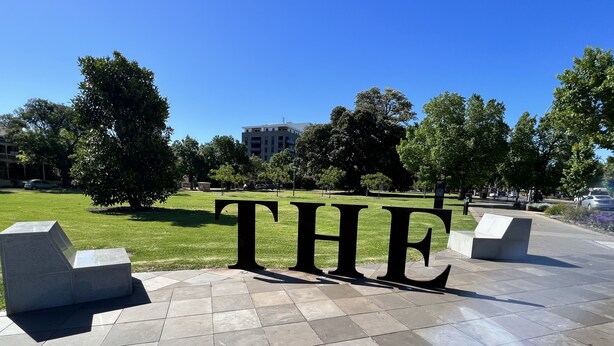 A paved area with large letters spelling "THE" and a building in the background. - ADELAIDE CENTRAL APARTMENT - 3BR, 2BATH & CARPARK (Adelaide)