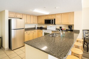 Fridge, microwave, oven, stovetop - Beautiful Direct Oceanfront 2-BR Condo on Top Floor at Broadwalk, Downtown (Myrtle Beach)