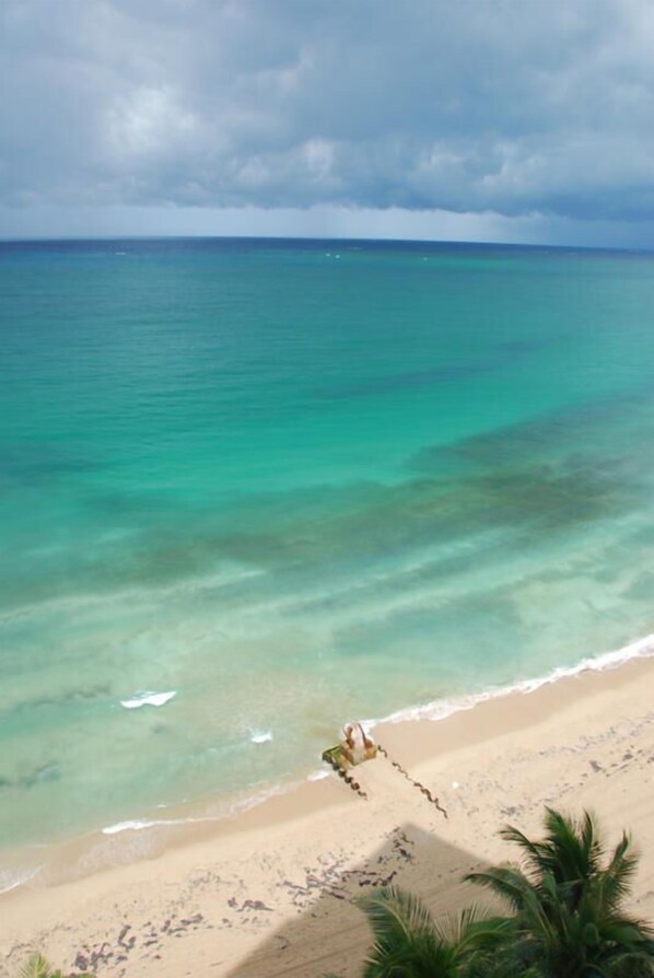 On the beach, sun-loungers, beach towels