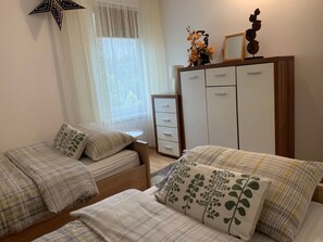 2 chambres, fer et planche Ă repasser, draps fournis