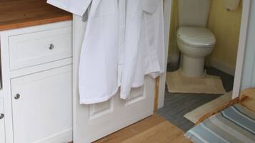 Shower, hair dryer, bathrobes, towels