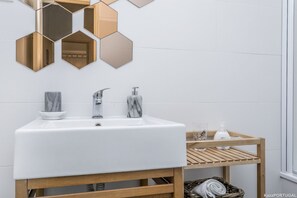 Bathtub, hair dryer, towels