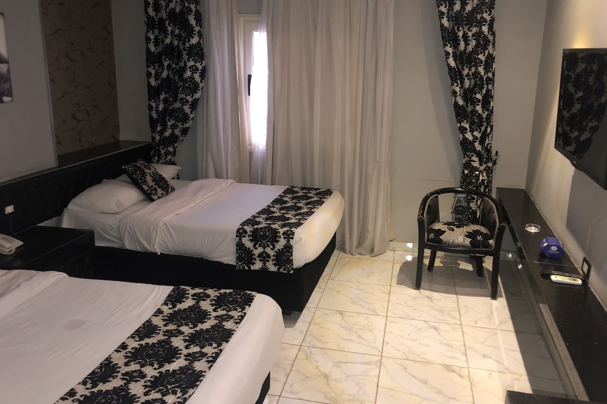 Blackout drapes, WiFi (free), bed sheets