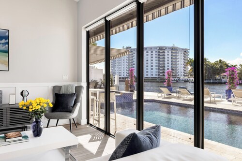 STUNNING - ON THE WATER!! - HEATED POOL - HOT TUB - WALK TO BEACH 