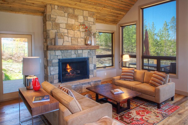 Cozy main floor seating area off deck with outdoor dining table