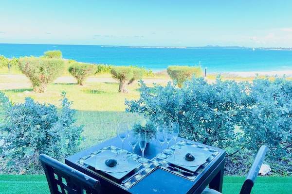 Romantic duo overlooking Orient Beach for breakfast, cocktail, diner time