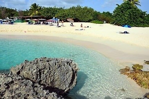 On the beach, sun-loungers, beach towels - SPECTACULAR BEACHFRONT 180° OCEANVIEW  ORIENTBEACH POOL - YOU TOUCH THE SAND ! (SAINT MARTIN)