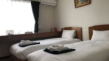 Down duvets, desk, blackout curtains, bed sheets