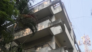 A multi-story building with balconies and a central entrance. - Maurya Residency (Pune)