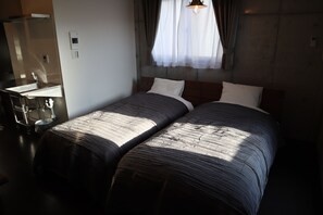 Chambre avec lits jumeaux (304) | Couette en duvet d'oie, ameublement personnalisé