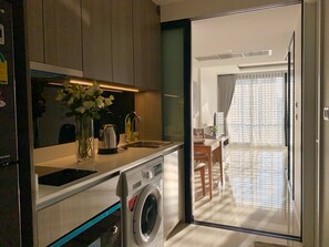 Family Quadruple Room, Kitchenette | Private kitchenette | Full-size fridge, microwave, stovetop, cookware/dishes/utensils