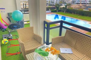 Basic Apartment, 2 Bedrooms, Balcony, Pool View | Terrace/patio