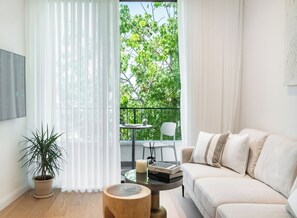 Two Bedroom Apartment with Balcony (stairs only) - 2 Yaavets St | Living area | 50-inch flat-screen TV with cable channels, Smart TV - Mr. Yavos - By TLV2GO (Tel Aviv)