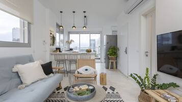 Three Bedroom Penthouse with Sea View | Living room | 50-inch flat-screen TV with cable channels, Smart TV