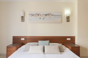 2 dormitorios, tabla de planchar con plancha, Internet y ropa de cama