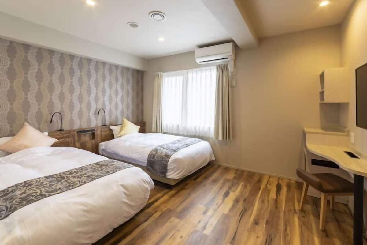 1 bedroom, desk, laptop workspace, iron/ironing board