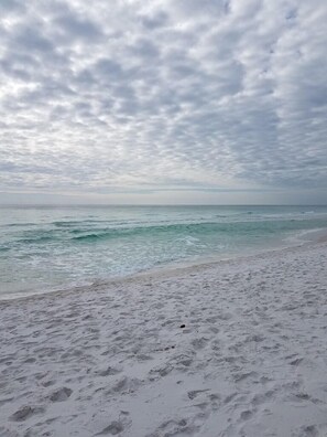 On the beach, sun-loungers