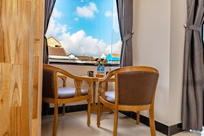 Deluxe Double Room, 1 Queen Bed, Balcony, City View | Room amenity - Little Boss Homestay (Da Nang)