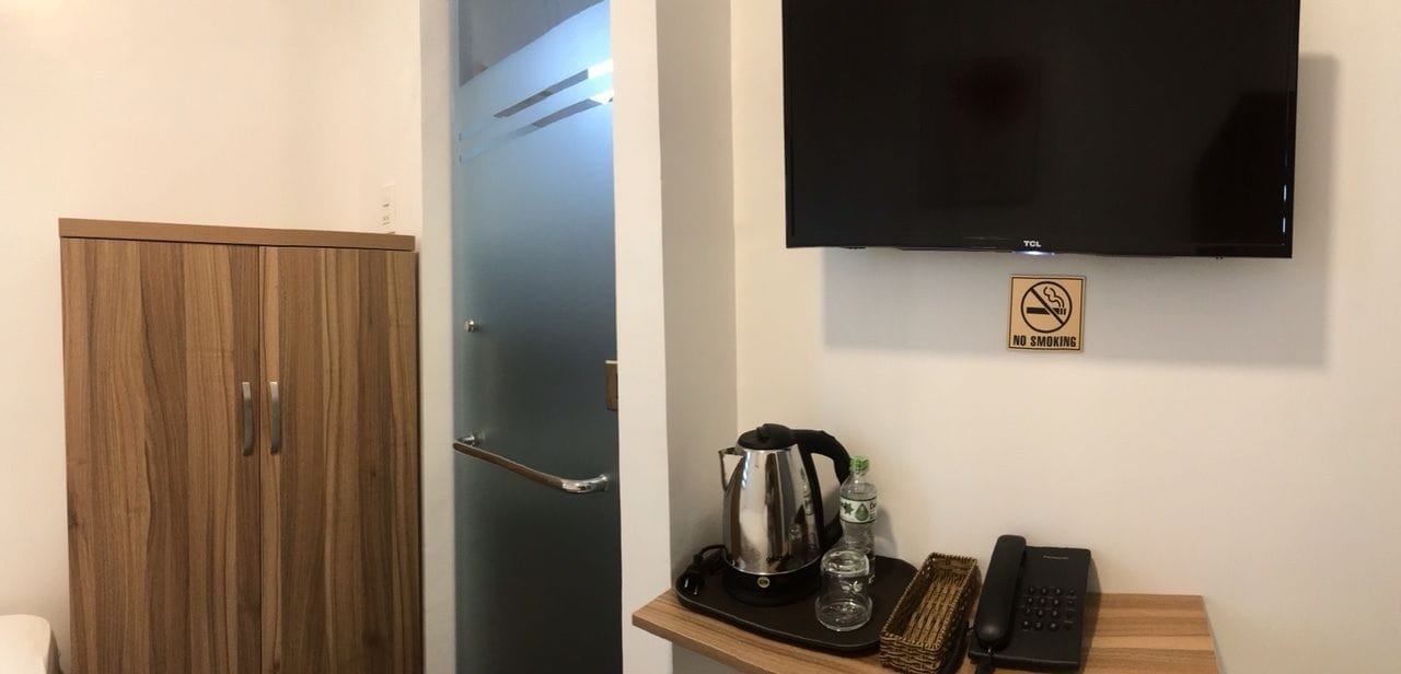 standard single room, 1 single bed, city view | living area | 32-inch smart tv with cable channels, tv