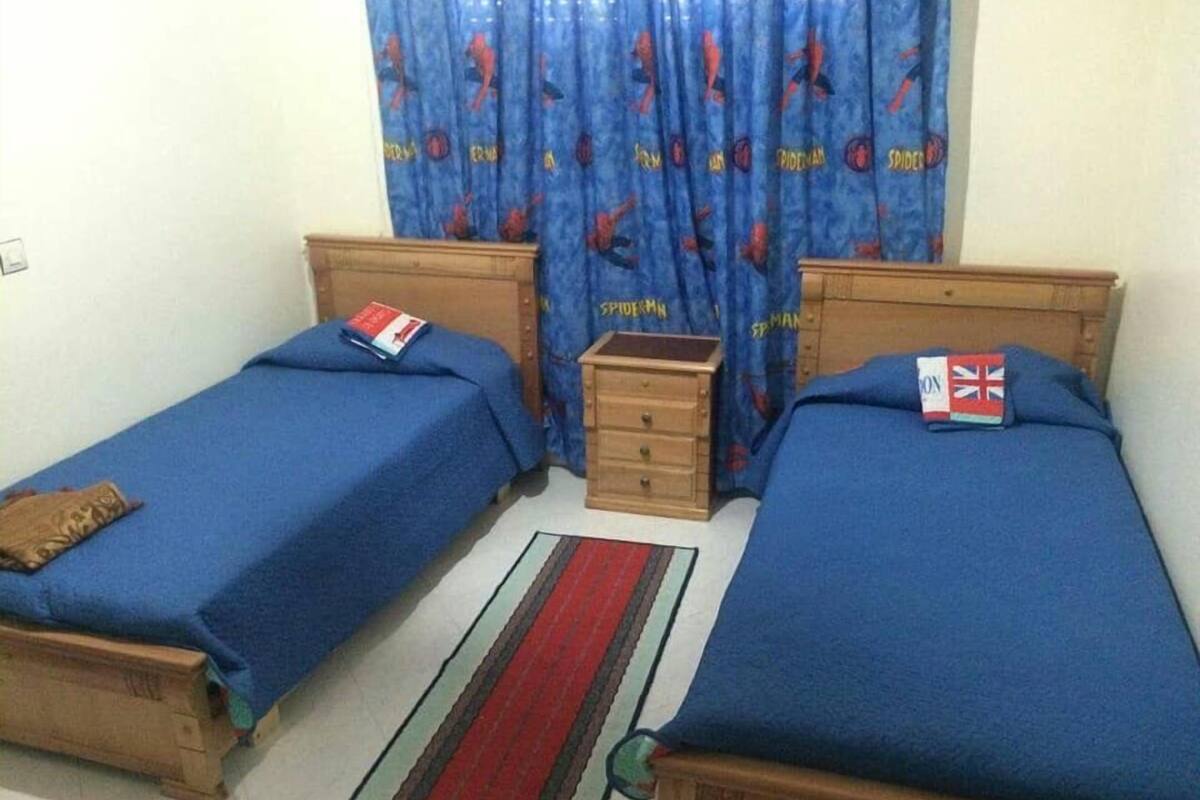 Apartamento família | Cortinas blackout, quartos à prova de som, roupa de cama
