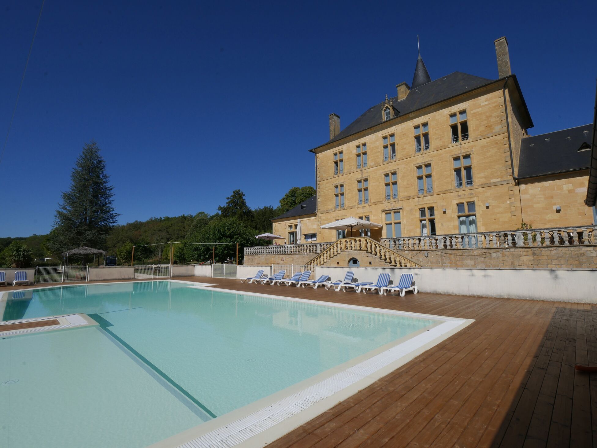 Seasonal outdoor pool, pool umbrellas, pool loungers