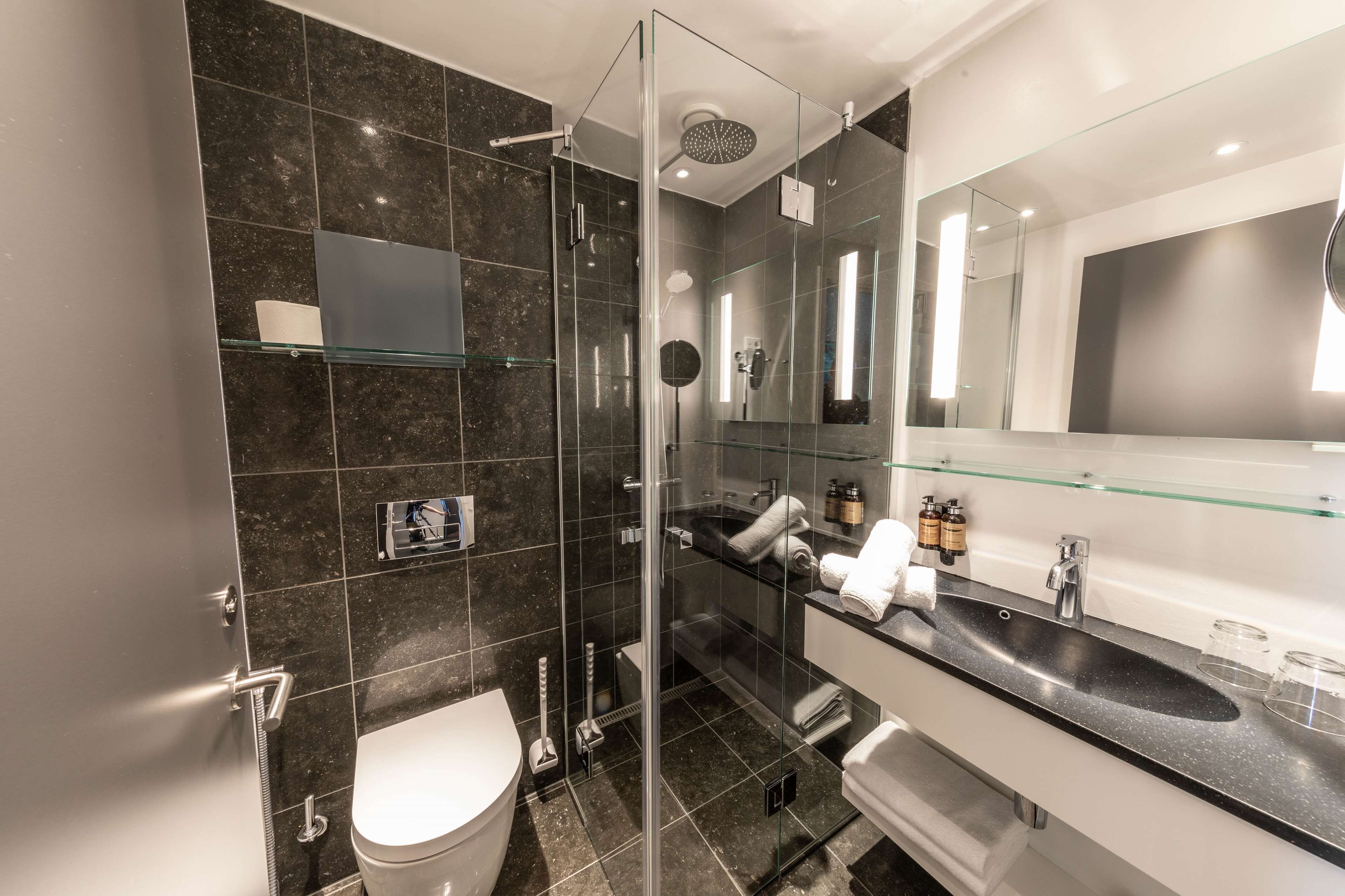 shower, bathrobes, slippers, towels