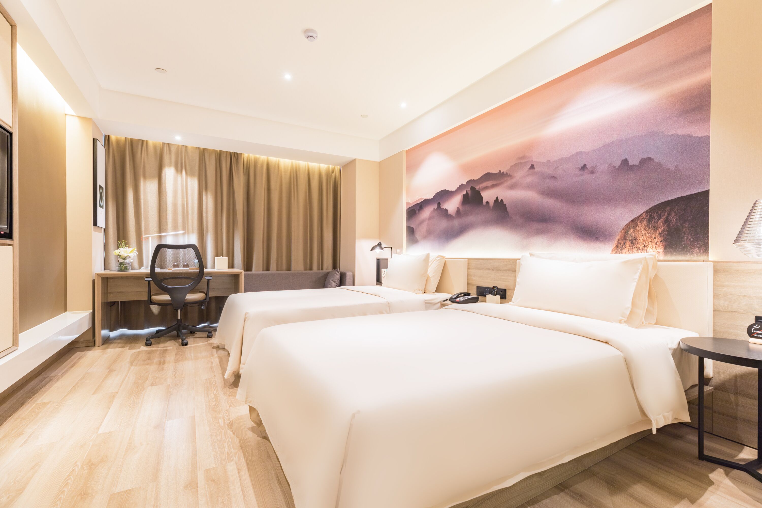 superior twin room | living area | flat-screen tv